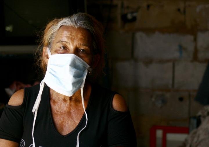 Nuvis is 64 years old. She has been selling coffee and cigarettes in front of the Port of Maracaibo, Venezuela. 